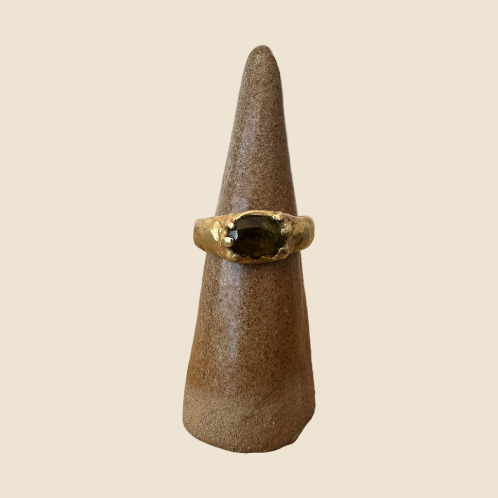 Green Tourmaline ring on stand